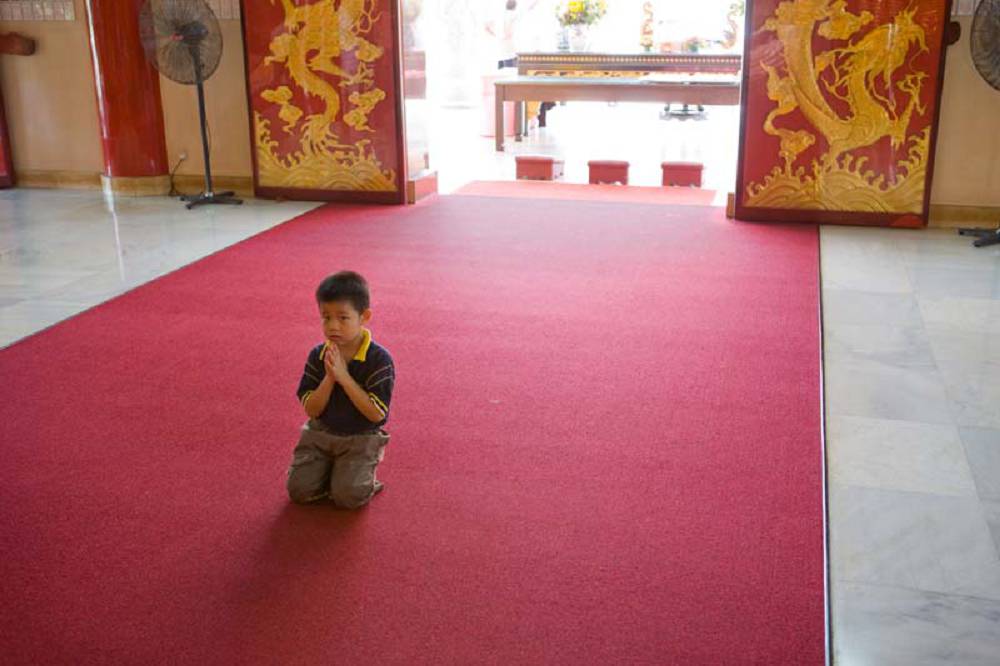 little boy praying two