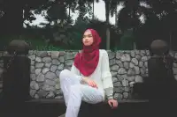 muslim girl on bench